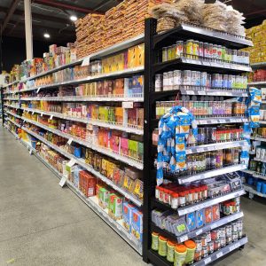 Asian supermarket aisle with packaged foods, sauces, and grocery products at Kiwi Choice New Zealand