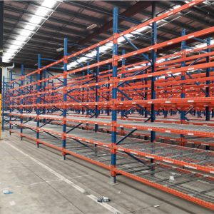 Heavy duty pallet racking system with wire mesh decking in industrial warehouse New Zealand