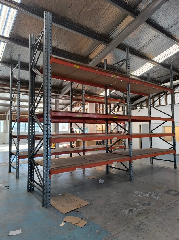 Long span shelving system with steel frame and timber shelves in warehouse storage facility New Zealand