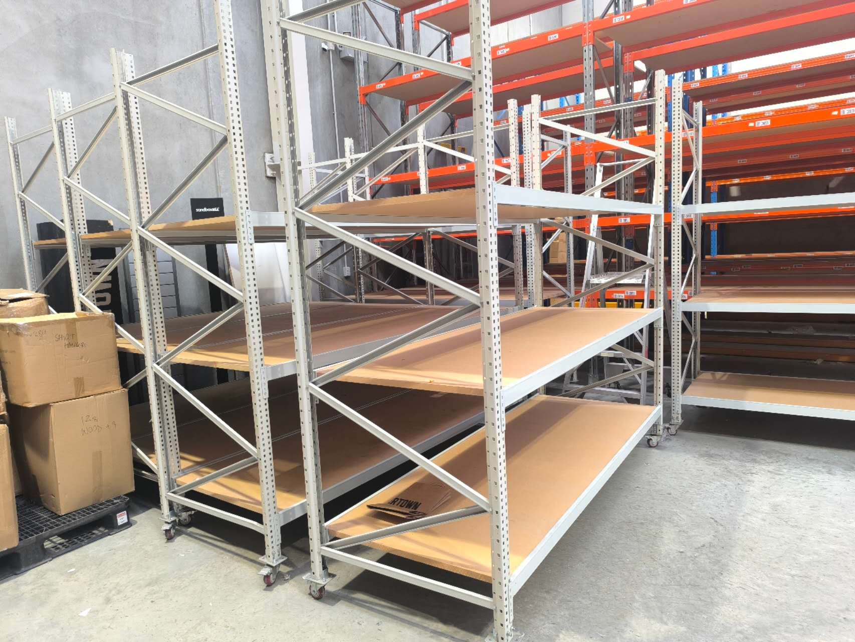 Mobile long span shelving units with wheels and timber shelves for warehouse storage solutions New Zealand